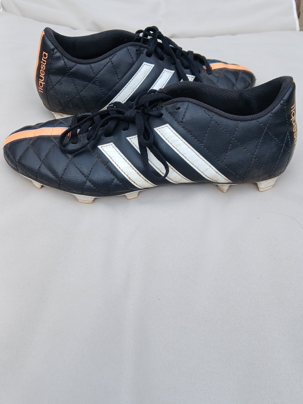 Adidas 11questra Black Quilted Soccer Cleats with White Stripes & Orange Accents